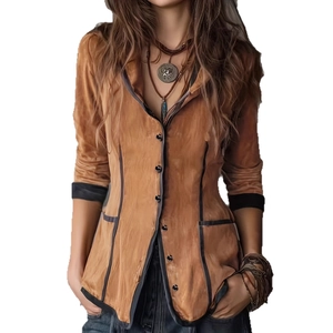 Close-up of contrast binding details and retro buttons on a tan suede jacket for women