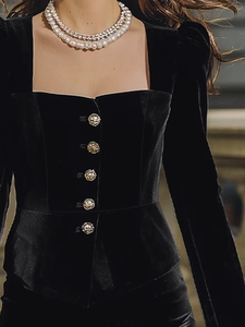 Elegant black velvet two-piece set featuring square neck top with gold buttons and mini skirt