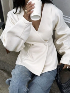 Chic ivory double-breasted blazer with deep V-neck and relaxed fit for casual wear
