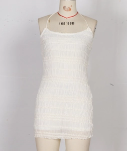 Detail view of the white ruched bodycon dress texture and halter neck drawstring design