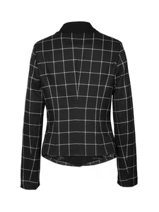 Detail view of the back of a slim fit houndstooth blazer with a solid black lapel collar