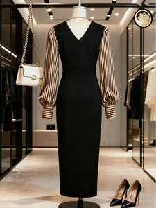 Slim fit V-neck midi dress featuring contrast lantern sleeves and button cuffs