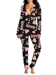 Close-up of pink love heart print and button closure on women's slim jumpsuit