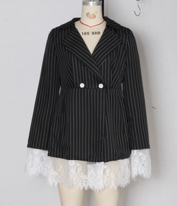 Detail of pinstripe blazer dress with white lace hem and double-breasted buttons