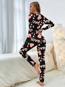 Women's black slim fit jumpsuit with pink heart and LOVE prints for Valentine's loungewear