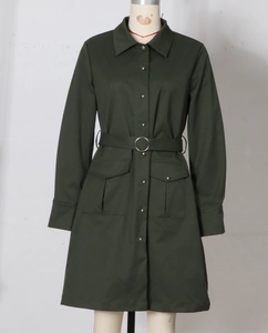 Detail of army green dress with silver snap buttons, lapel collar, and belted waist