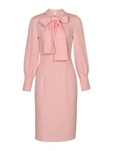 Elegant pale pink long sleeve pencil dress with bow tie neck and slim fit waistline