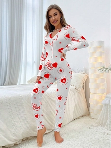 Detail of red heart and Love print on slim fit white long sleeve romper sleepwear