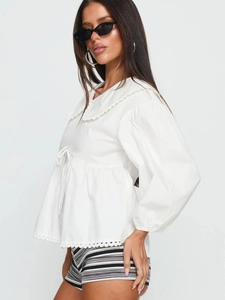 White long-sleeve blouse featuring Peter Pan collar with lace and drawstring waist detail