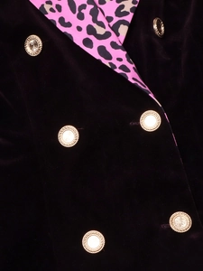 Women's velvet blazer featuring leopard print collar and embossed gold buttons