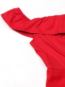 Close-up of off-shoulder neckline with elastic ruffled edges and red mesh stitching