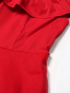 Detail of red off-shoulder evening dress featuring ruffled neckline and mesh splicing fabric