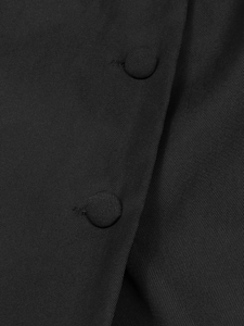 Close-up of black twill blazer dress featuring premium fabric-covered buttons detail