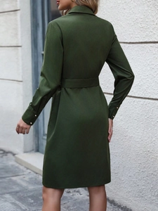 Elegant dark green button-down midi dress with lapel, waist belt, and golden cuff details