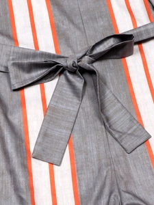 Women's striped loose jumpsuit with waist tie and orange accent stripes