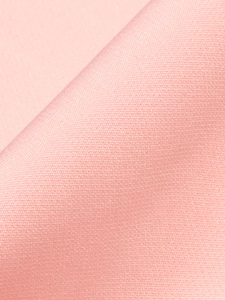Close-up of pink woven fabric texture with durable grain for elegant bow dresses