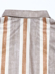 Detail of classic striped shirt collar showing vertical brown and beige lines