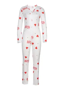Detail of V-neck button closure on women's white jumpsuit with red heart and love prints