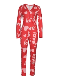 Close-up of red slim fit jumpsuit with heart and love letters pattern with white buttons
