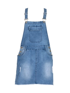 Detail of adjustable metal buckles and chest pocket on blue denim overall dress