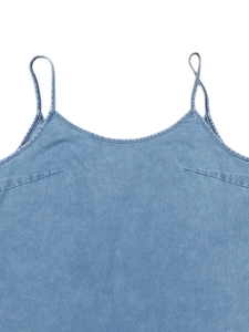 Blue denim camisole dress with Italian straps and loose stitching hem for a summer look