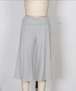 Detailed macro view of gray wide-leg casual pants showing the high-waisted elastic waistband