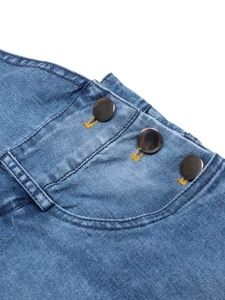 Blue washed denim overall dress with metal buttons and yellow contrast stitching detail