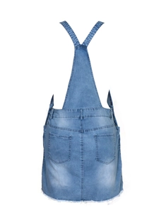 Detail view of denim overall dress back showing pockets and frayed fringe hem