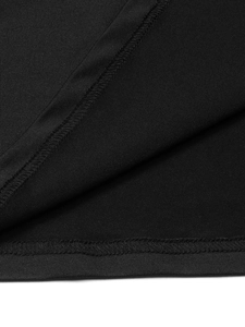 Vista macro de tejido de punto negro con detalle de dobladillo de doble aguja de alta calidad