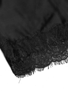 Women's black satin camisole dress featuring elegant eyelash lace trim detailing