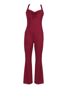 Slim fit burgundy halter jumpsuit with lace trim and bow neckline on white background