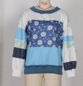 Detail of floral print and color block stitching on women long sleeve sweatshirt