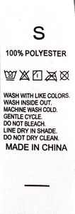 Detail showing the wash care label for the women's camisole dress made of 100% polyester