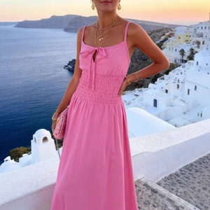 Pink backless A-line maxi dress with smocked waist and bow tie detail in Santorini