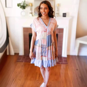 Women's V-neck patchwork floral mini dress with ruffled hem and bohemian style