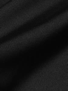 Close-up of high-quality black fabric showing detailed ribbed texture and weave pattern
