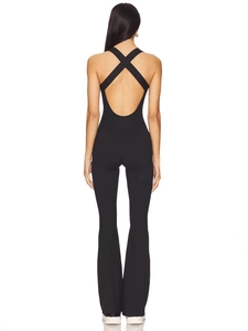 Slim fit black backless jumpsuit with cross straps and flared leggings for women