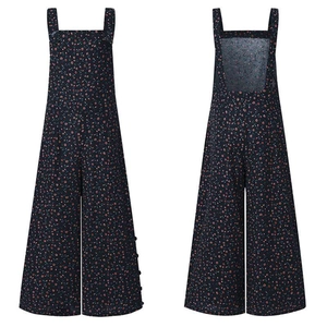 Combinaison fleurie femme à jambes larges, dos nu et motif floral sur fond bleu marine