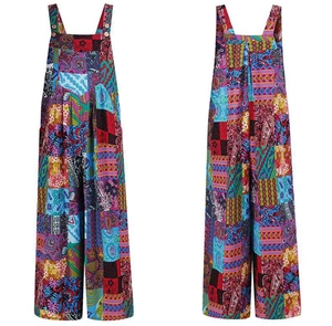 Detail view showing colorful paisley patchwork print and shoulder buttons on loose overalls