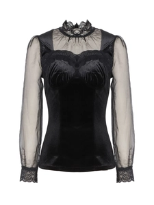 Detail of black velvet long sleeve top with sheer mesh sleeves and delicate lace trim