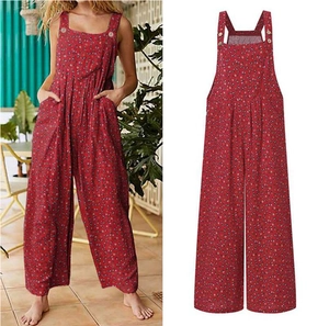 Detail view of red floral jumpsuit featuring square neck straps and wide-leg cut