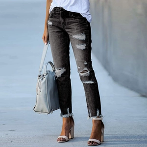 Jean skinny gris foncé pour femme avec trous déchirés et ourlet effiloché style mode