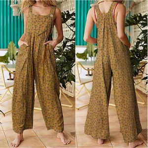 Women's floral wide leg jumpsuit with pockets and straps in a casual summer boho style