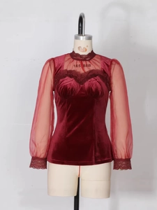 Slim fit wine red velvet top featuring sheer lace sleeves and a high neck Victorian design