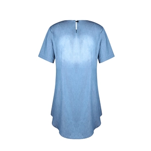 Detail of light blue denim dress with round neck and elegant curved hemline