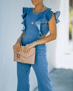 Blue denim jumpsuit with ruffle sleeves, waist cut-outs and wide-leg trousers