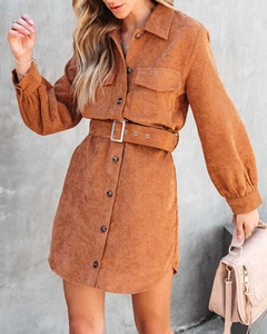 Detailed view of the caramel corduroy shirt dress fabric and matching belted waist