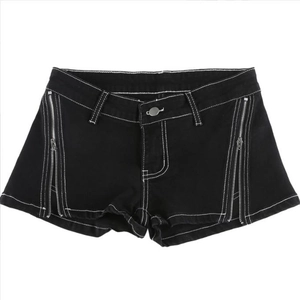 Detail of black denim shorts featuring white contrast stitching and side metal zippers