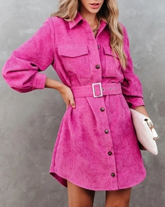 Detail of fuchsia corduroy shirt dress with waist belt and metal buckle close-up