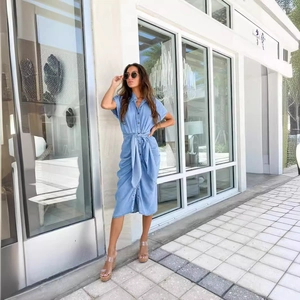 Short sleeve light blue denim midi dress with lapel collar and waist tie belt